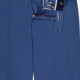 The PT TORINO Slim Flat Front Garment Dyed Trouser Pant features blue cotton silk blend fabric, a flat front, side pockets, striped inner waistband, button closure, front fly with zipper, visible stitching, and dark buttons.