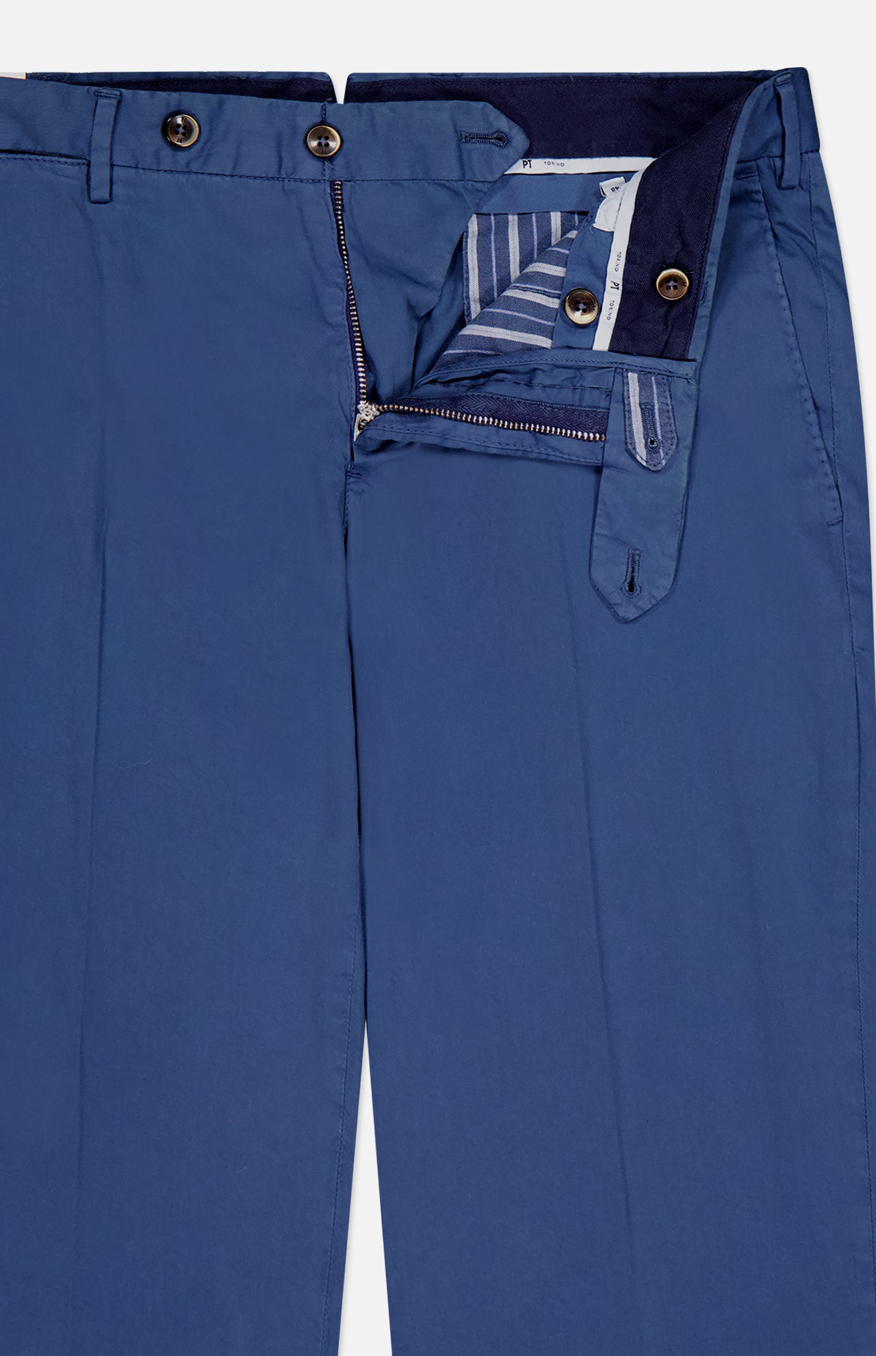 The PT TORINO Slim Flat Front Garment Dyed Trouser Pant features blue cotton silk blend fabric, a flat front, side pockets, striped inner waistband, button closure, front fly with zipper, visible stitching, and dark buttons.