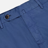 Close-up of the waistband and top of PT TORINO's Slim Flat Front Garment Dyed Trouser Pant, showcasing a button closure, belt loops, and a concealed zipper fly.