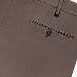 Close-up of PT TORINO Slim Flat Front Soft Fine Trouser Pant, featuring a back pocket with button, belt loops, and subtly textured slim fit fabric for the professional man.