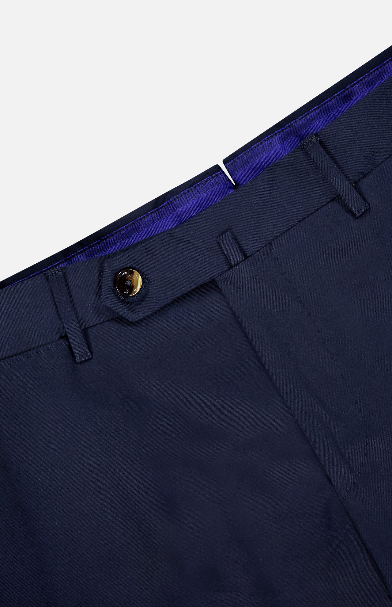 Close-up of the waistband and upper section of PT TORINO's Slim Flat Front Stretch Fine Twill Trouser Pant, featuring a brown button, belt loops, and a glimpse of blue-purple inner lining.