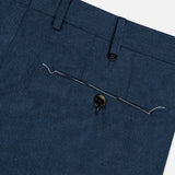 Close-up of the back waist and buttoned welt pocket of slim fit teal blue Slim Flat Front Supreme Comfort Trousers by PT Torino.