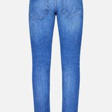 The PT TORINO Soft Touch Light Stretch Jeans feature two back pockets, belt loops, a tan leather waistband patch, and a slightly tapered leg in stretch denim, shown from the back.