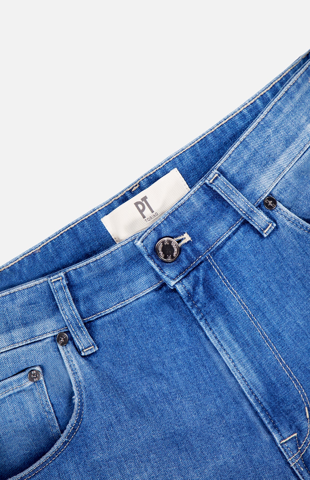 Close-up of the waist on PT TORINO's Soft Touch Light Stretch Jeans in blue denim, featuring a black button, belt loops, front pockets, and an inner white label with "PT" on the waistband.