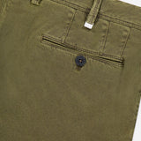 Close-up of PT TORINO Stretch Fine Canvas Trouser Pants in slim fit dark green, highlighting the back pocket with a black button, belt loops, and visible stitching on cotton canvas fabric.