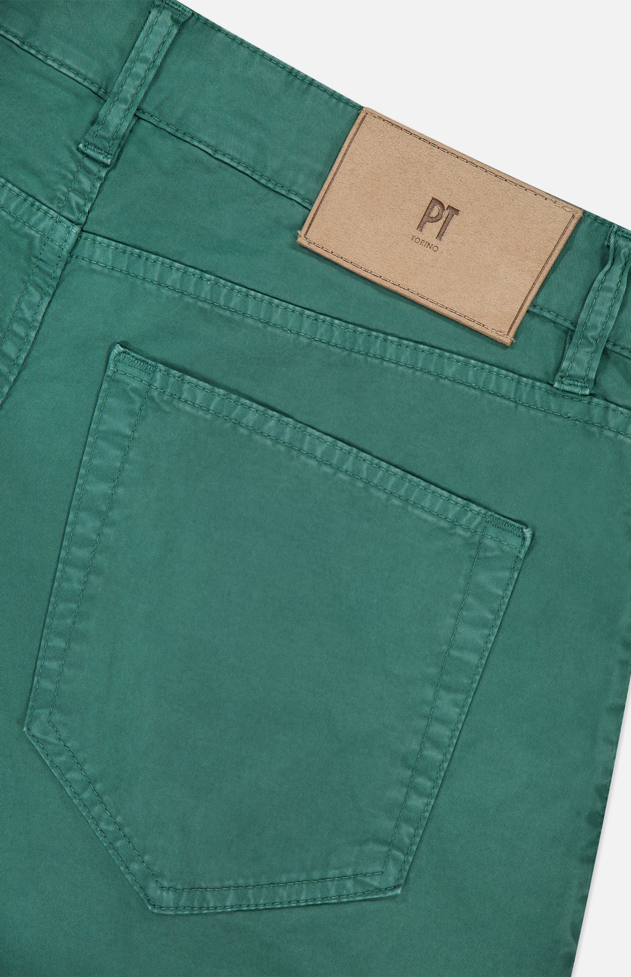 Close-up of the back pocket and waistband of PT TORINO Stretch Gabardine 5-Pocket Pants in green, with a brown leather logo patch above the pocket, visible stitching, and a classic 5-pocket design.