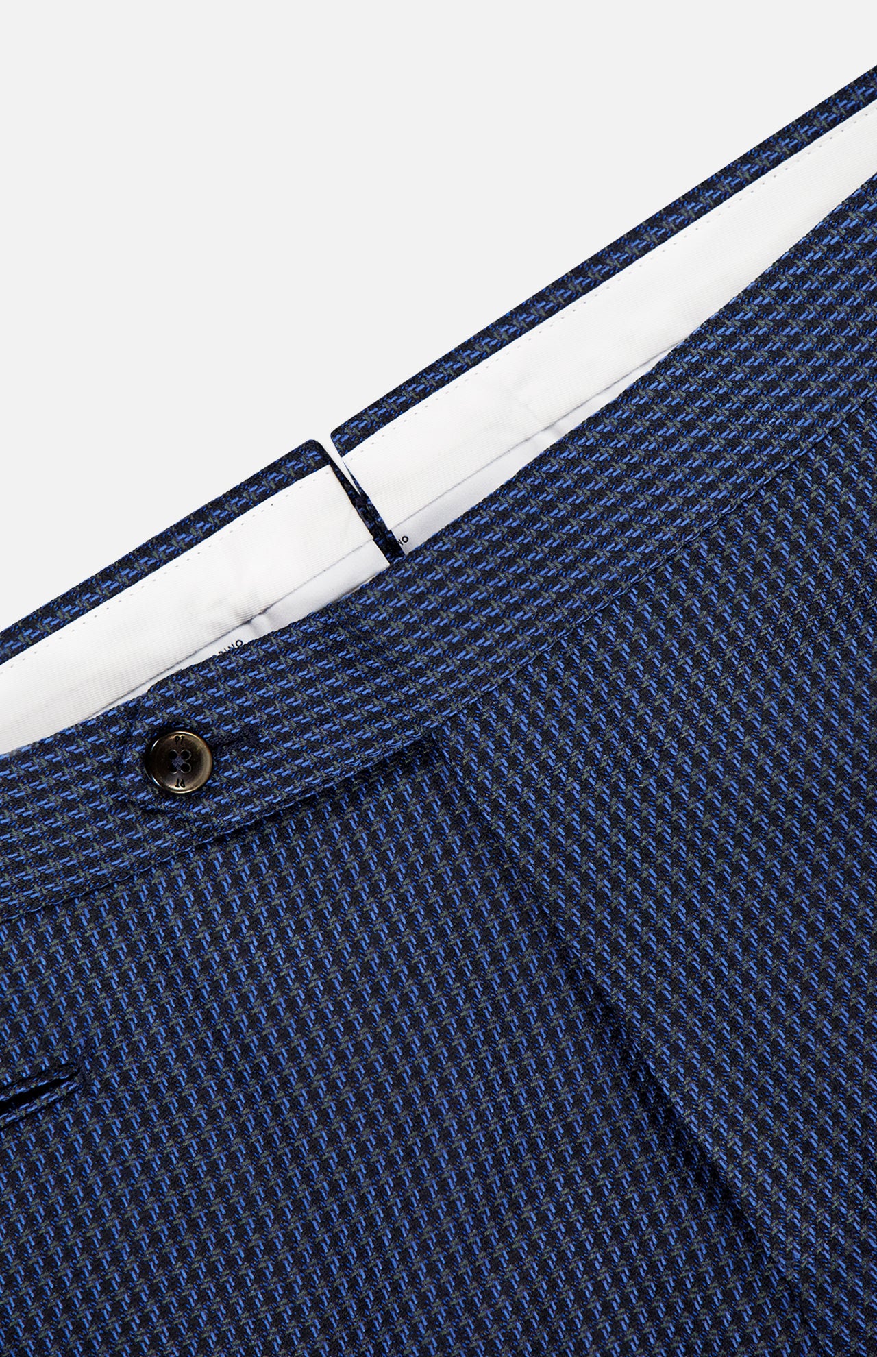 Close-up of the waistband and upper section of PT TORINO Super 100's Wool Fancy Trouser Pants in blue, featuring a textured finish, black button, and visible white inner lining.