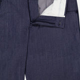 Close-up of PT TORINO Thermo Superlight Stretch Wool Trouser Pants in navy, with the zipper and top button undone to reveal the white inner waistband and lining.