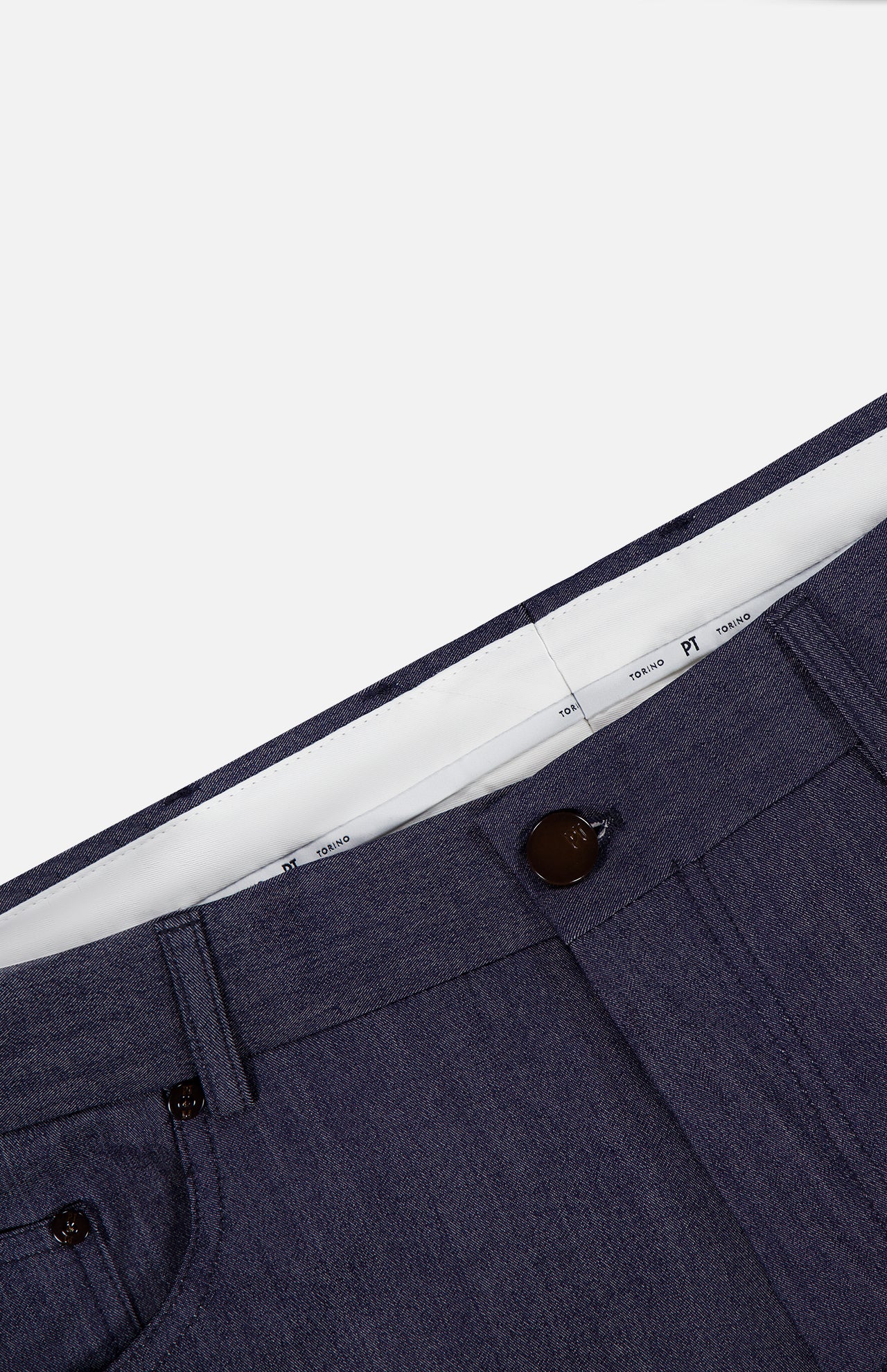 Close-up of the waistband and upper front section of the PT TORINO Thermo Superlight Stretch Wool Trouser Pants in navy, showcasing a visible button, partial inner lining, and textured stretch wool fabric. The design includes belt loops and side pockets, highlighting the high-quality craftsmanship.