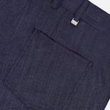 Close-up of the back pocket and waistband of PT TORINO Thermo Superlight Stretch Wool Trouser Pants, showcasing refined belt loops and a discreet fabric tag near the top right—details that echo the craftsmanship typically found in luxury garments.