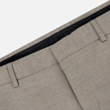 Close-up of the waistband and upper section of the PT TORINO Traveler Light Stretch Structure Trouser Pant in beige, featuring belt loops, shown against a plain white background.