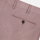 Close-up of PT TORINO Wool & Cotton Stretch Oxford Trouser Pants in light mauve, featuring a back pocket with button closure, belt loops, and a small metallic tag above the pocket on a white background.