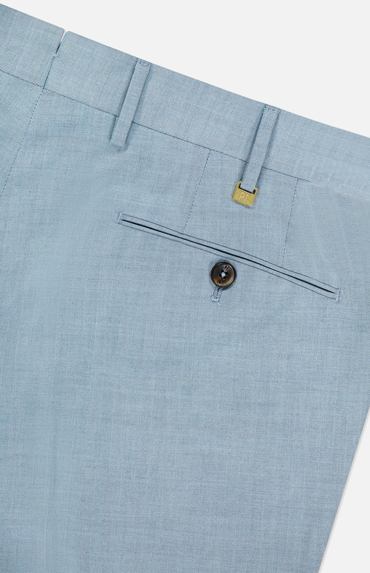 Close-up of the back pocket on PT TORINO's Wool Blended Solaro Trouser Pants, featuring a button closure, belt loops, a gold tag above the pocket, and subtly textured wool-blend fabric for effortless office chic.