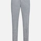 The PT TORINO Wool Cashmere Flannel Trouser Pants are light blue with a white check pattern, slim fit, and feature a waistband, belt loops, front button, and zipper; shown against a white background.