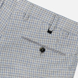 Close-up of PT TORINO Wool Cashmere Flannel Trouser Pants in light blue check, slim fit with rear pocket, black button, and belt loops against a white background.
