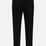 The PT TORINO Wool Cotton Soft Bull Trouser Pant showcases a slim fit in classic black, featuring a front button and zipper closure, belt loops, and convenient side pockets—ideal for professional attire. Shown against a plain white background.