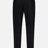 Back view of the PT TORINO Wool Cotton Soft Bull Trouser Pant in black, featuring belt loops, two buttoned back pockets, and tailored seams—displayed against a plain white background for a polished professional look.