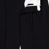 PT TORINO’s Wool Cotton Soft Bull Trouser Pant in black is showcased with the waistband and zipper partially open, revealing a white inner lining and button closures. Neatly laid flat on a white background, these tailored trousers are ideal for professional attire.