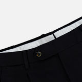Close-up of the waistband of the PT TORINO Wool Cotton Soft Bull Trouser Pant in black, featuring a visible button, belt loops, and white inner lining against a plain background—perfect for professional dressing.