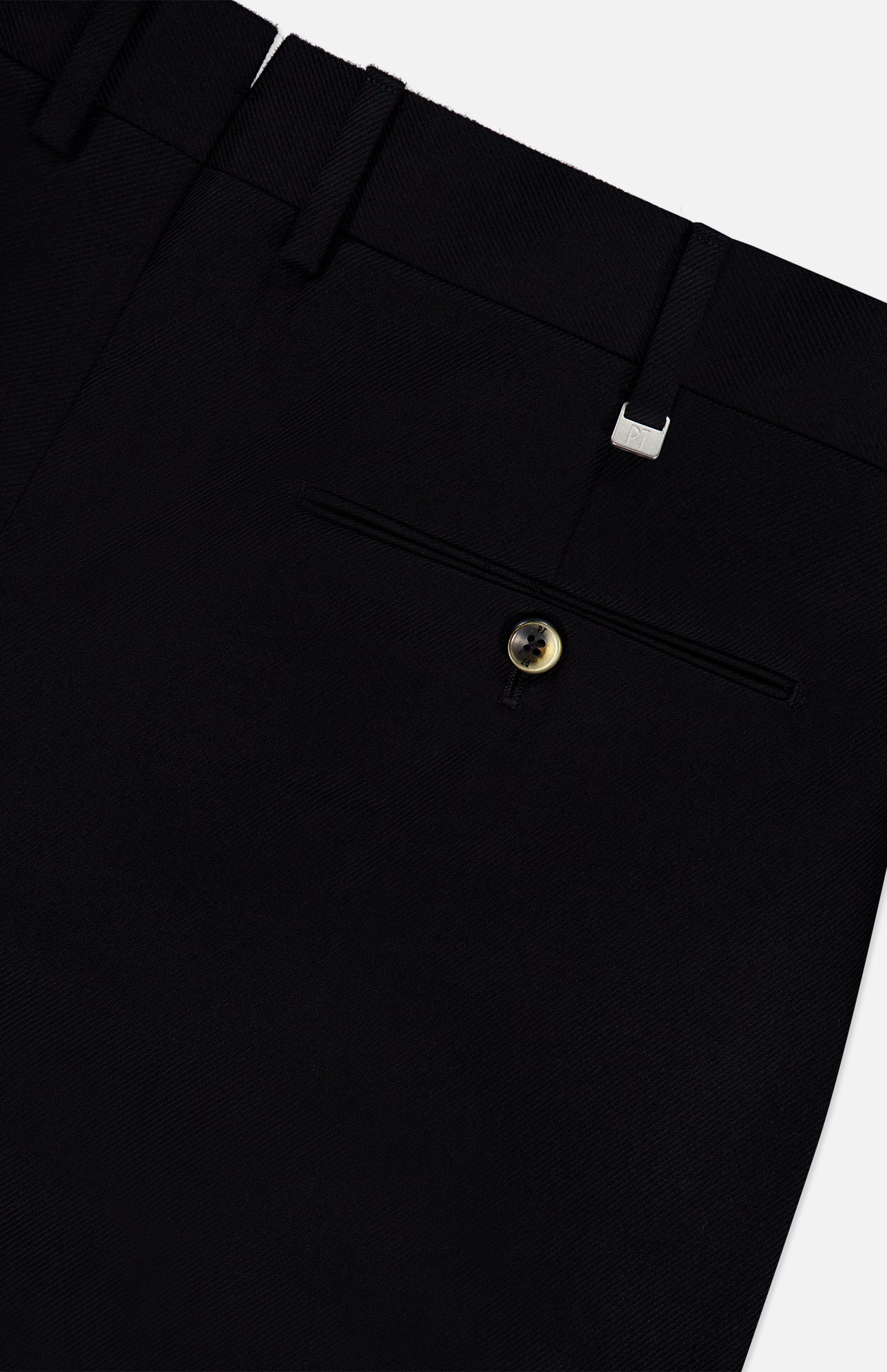 Close-up of the Wool Cotton Soft Bull Trouser Pant by PT TORINO in black, highlighting the tailored waistband with belt loops and a single buttoned back pocket. The smooth, refined wool-cotton blend fabric makes these pants an excellent option for professional attire.