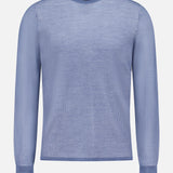 The Gregory Merino Long Sleeve Crewneck Sweater by RAG & BONE features a light blue hue, slim fit, ribbed cuffs, and a subtle textured pattern; shown here on a plain white background.