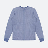 Back view of the RAG & BONE Gregory Merino Long Sleeve Crewneck Sweater in blue, featuring a slim fit, subtle striped pattern, and solid blue cuffs, hem, and neckline. Displayed on a plain light gray background.