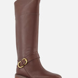 The RAG & BONE Hayden Leather Riding Boot is a tall, knee-length brown leather boot featuring a low heel, rounded toe, and gold buckle detail on the ankle strap.