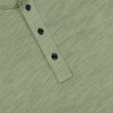 Light green, textured cotton Classic Flame Henley Shirt by RAG & BONE, featuring three black buttons and a visible brand label at the neck. The shirt is laid flat to showcase the button placket and part of the collar—making it a versatile casual wardrobe staple.