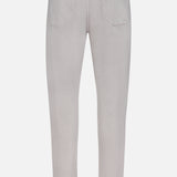Back view of the RAG & BONE Fit 3 Aero Stretch Pant in light grey, crafted with comfort denim and Aero Stretch technology, featuring two rear pockets, belt loops, and visible stitching, displayed against a white background.