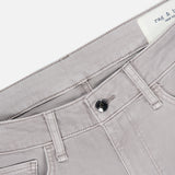 Close-up of the waistband and upper section of the RAG & BONE Fit 3 Aero Stretch Pant in light grey, showcasing Aero Stretch technology, a black button, belt loops, and a partially visible label inside the waistband.