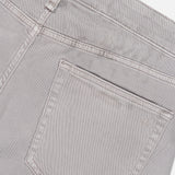 Close-up of the back pocket and waistband of the RAG & BONE Fit 3 Aero Stretch Pant in light grey, highlighting stitching details and a belt loop against a plain background for ultimate comfort and denim-inspired style.