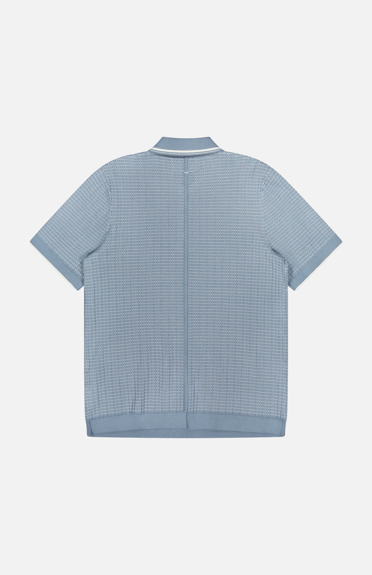 The Harvey Rib Polo Shirt by RAG & BONE is shown from the back in light blue-grey, featuring a retro stitch-textured pattern, ribbed hem and cuffs, and a flat collar with a subtle white stripe for vintage appeal.