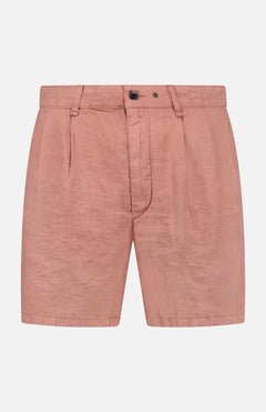 The RAG & BONE Jackson Pleated Linen Short in light pink features a classic fit, belt loops, front pleats, button closure, and zip fly, shown against a plain white background.