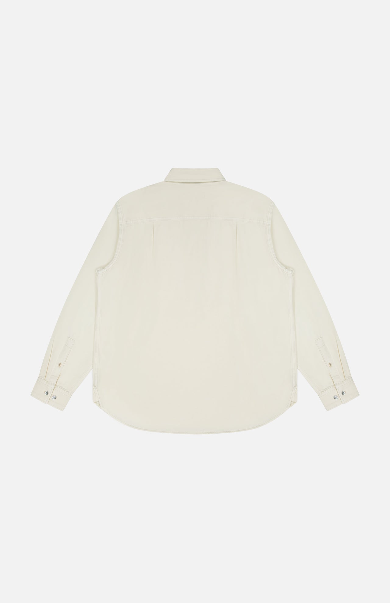 The Popover Long Sleeve Shirt by RAG & BONE is shown from the back in cream cotton, featuring a classic collar, buttoned cuffs, and a curved hem—ideal for those wanting a timeless minimalist look.