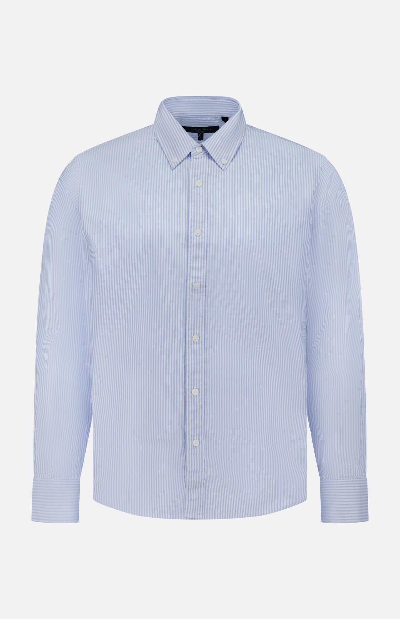 The RB Classic Striped Oxford Shirt by RAG & BONE features light blue and white vertical stripes, long sleeves, and a button-down collar, shown against a plain white background.