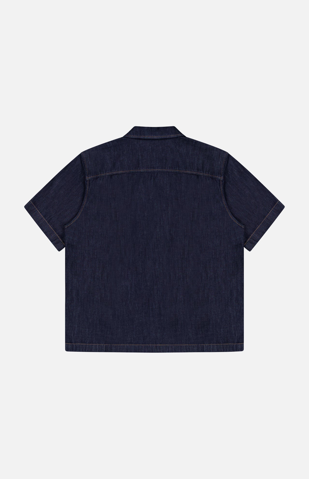 Back view of the RAG & BONE Resort Denim Shirt, a short-sleeve, featherweight camp shirt with contrast stitching and a straight hem, shown on a plain white background.