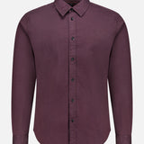 The Tomlin Dobby Dress Shirt by RAG & BONE is a long-sleeved, button-up burgundy shirt with a collar, crafted from stretch cotton and displayed on a plain white background.