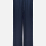 The Olivia Contrast Stripe Pant by RAG & BONE features a navy blue satin wide-leg silhouette with a relaxed fit and elastic waistband, displayed against a plain white background.