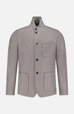 The Prospect Wool Blazer by RAG & BONE is a light grey, single-breasted men's blazer with a stand collar, four black buttons, one chest pocket, and two large front pockets, crafted from premium wool-blend by Takisada-Osaka. Displayed on white background.