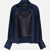 The RAG & BONE Venus Popover Removable Cami Blouse in dark navy satin, featuring a black lace-trimmed camisole, is displayed against a plain white background.