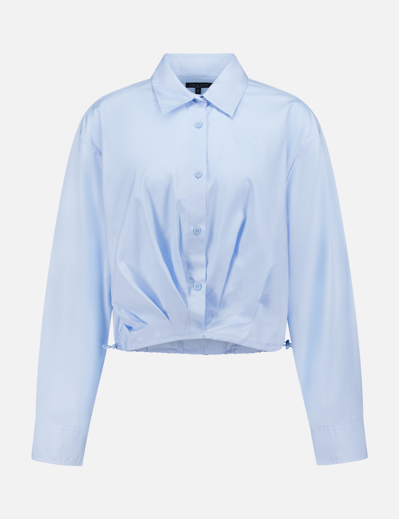 The Andy Pleated Drawcord Top by RAG & BONE is a light blue, long sleeve cotton blouse with a collar, button-down front, pleated details, and a gathered hem, shown on a plain white background.