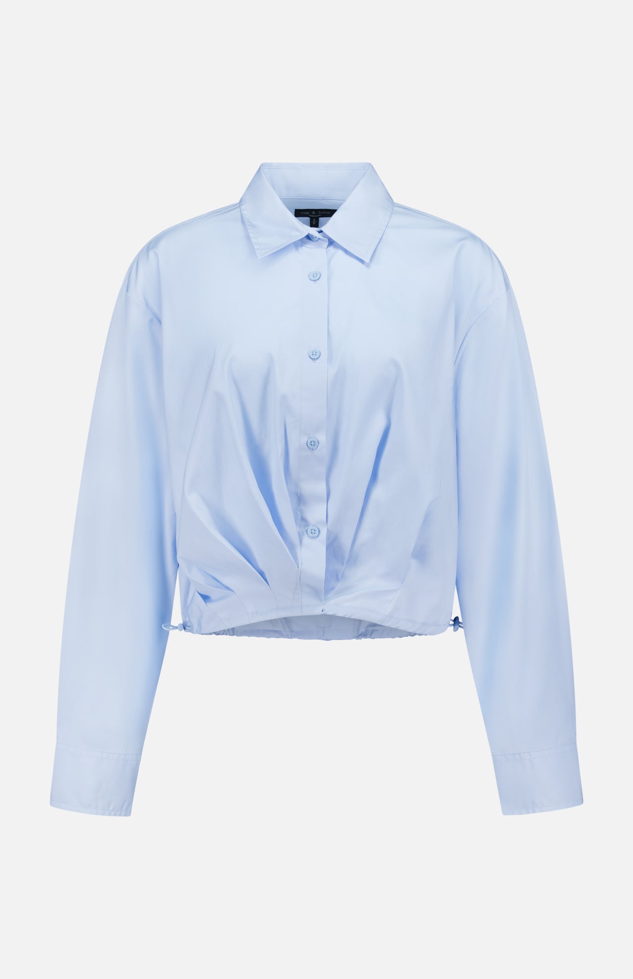 The Andy Pleated Drawcord Top by RAG & BONE is a light blue, long sleeve cotton blouse with a collar, button-down front, pleated details, and a gathered hem, shown on a plain white background.