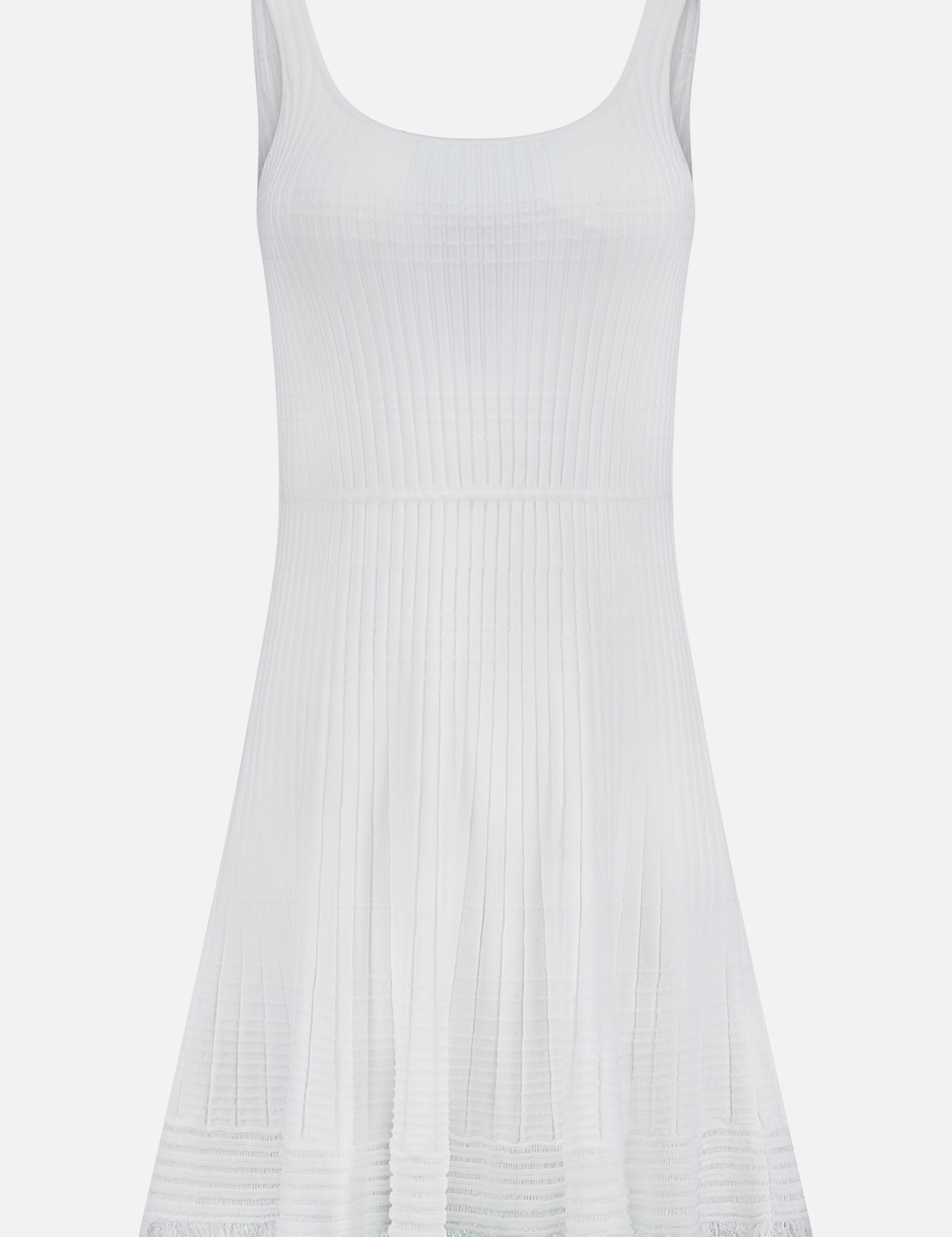 The RAG & BONE Ayan Mini Dress features a sleeveless white rib-knit bodice, scoop neckline, flared skirt, subtle pleats, and a textured hemline with fringe trim. Shown against a plain white background.