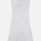 The Ayan Mini Dress with Fringe Trim by RAG & BONE is a sleeveless white dress featuring a rib-knit bodice, flared skirt, scoop neckline, and fringe trim at the hemline. Shown against a plain white background.