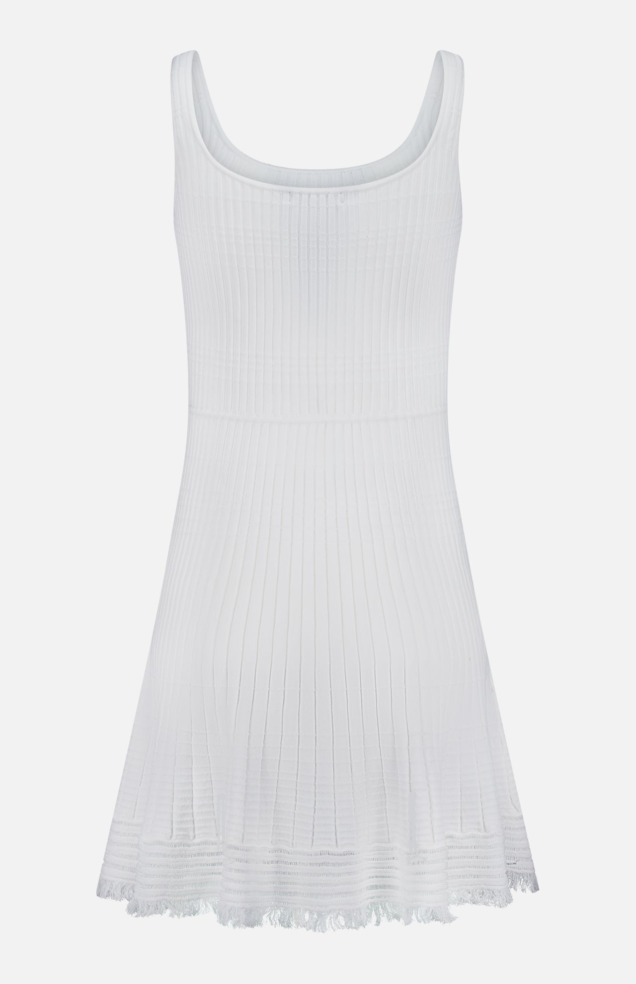 The Ayan Mini Dress with Fringe Trim by RAG & BONE is a sleeveless white dress featuring a rib-knit bodice, flared skirt, scoop neckline, and fringe trim at the hemline. Shown against a plain white background.