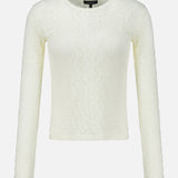 Rag & Bone Bardot Long Sleeve Top in cream-colored off-white lace with a textured, semi-sheer knit pattern, long sleeves, and a crew neckline.