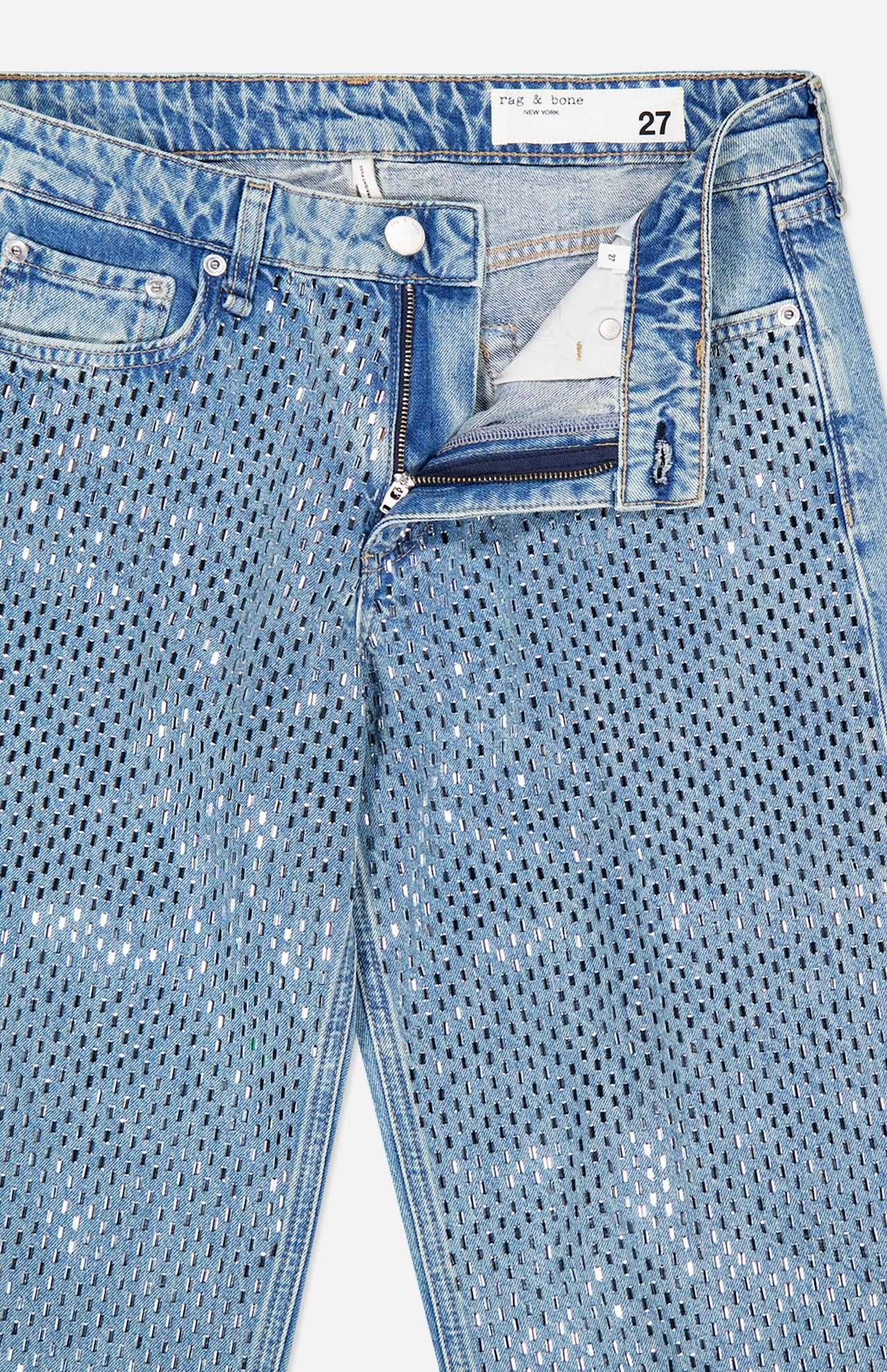 RAG & BONE Cam Full Straight Jean in Dekalb Jewel: light-wash blue straight leg jeans with an all-over pattern of silver rectangular embellishments and a partially unzipped fly.