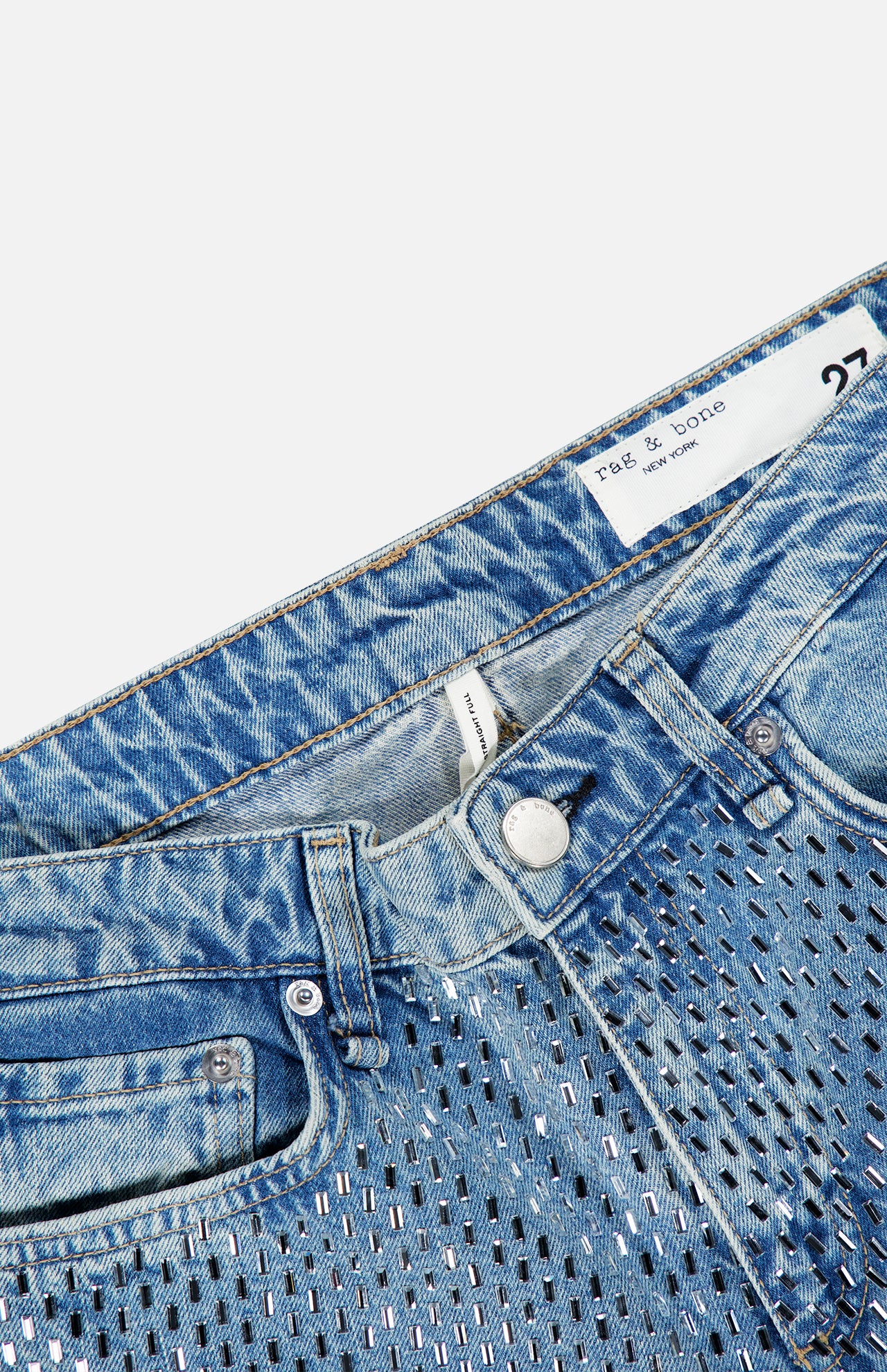 RAG & BONE Cam Full Straight Jean in Dekalb Jewel, featuring light wash blue denim with a studded front panel, baguette crystals, and a size 27 waistband label.
