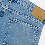 Rag & Bone Cam Full Straight Jean in Dekalb Jewel: light blue low-rise straight leg jeans featuring a tan leather patch on the waistband and an embroidered logo on the back pocket.