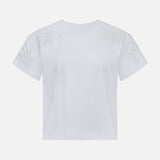 Back view of the RAG & BONE Floral Cutout Kelly Boxy T-shirt, a white summer tee featuring delicate floral cut-out embroidery on the shoulders and sleeves.